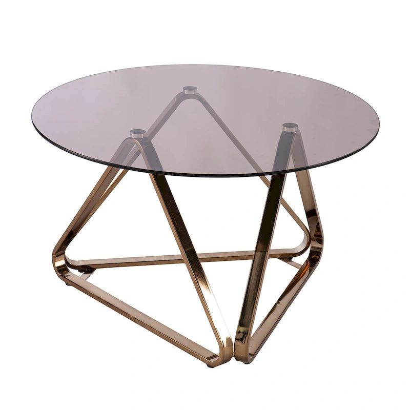 Table basse contemporaine en verre et piètement métallique géométrique couleur champagne