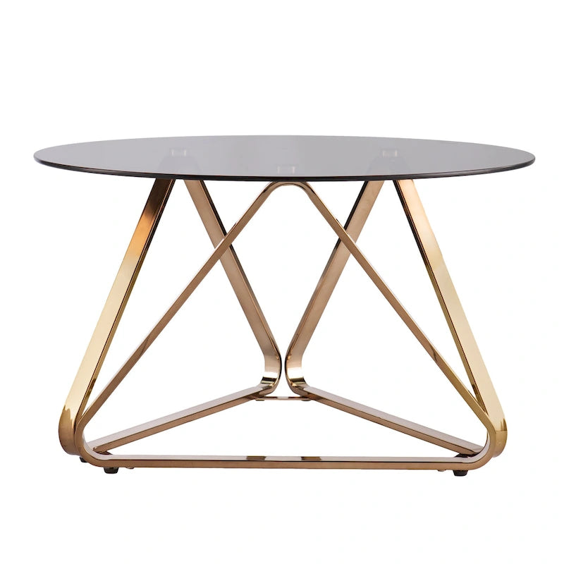 Table basse contemporaine en verre et piètement métallique géométrique couleur champagne
