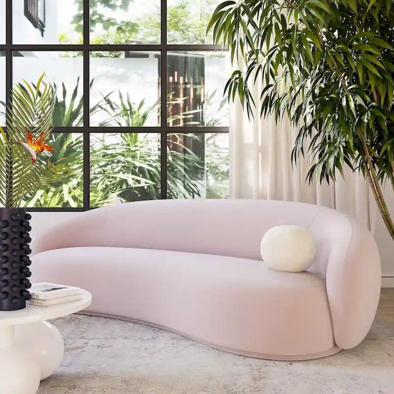 Canapé en velours avec silhouette incurvée et revêtement moelleux