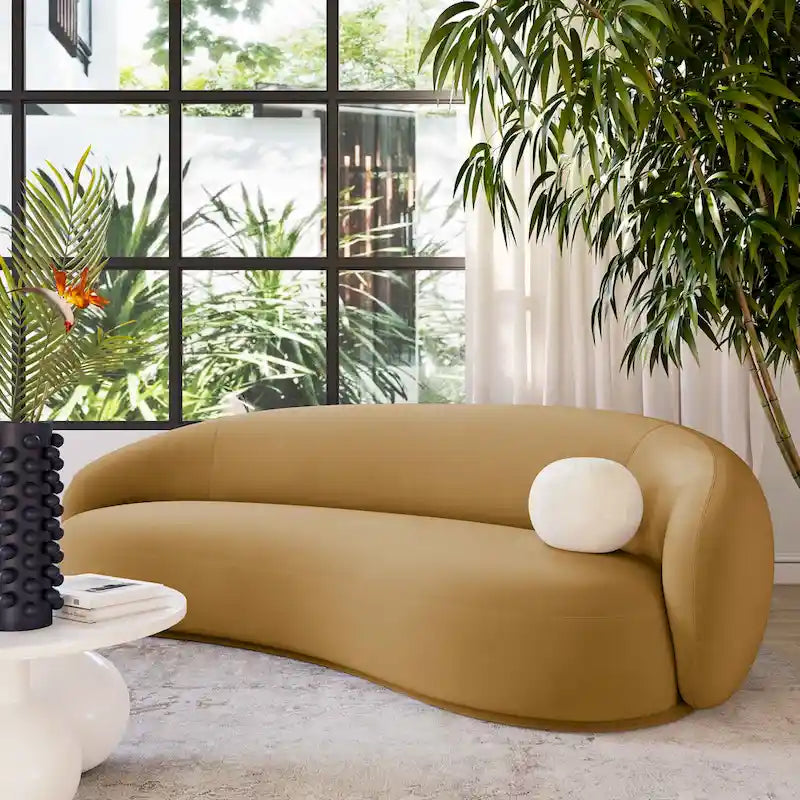 Canapé en velours avec silhouette incurvée et revêtement moelleux